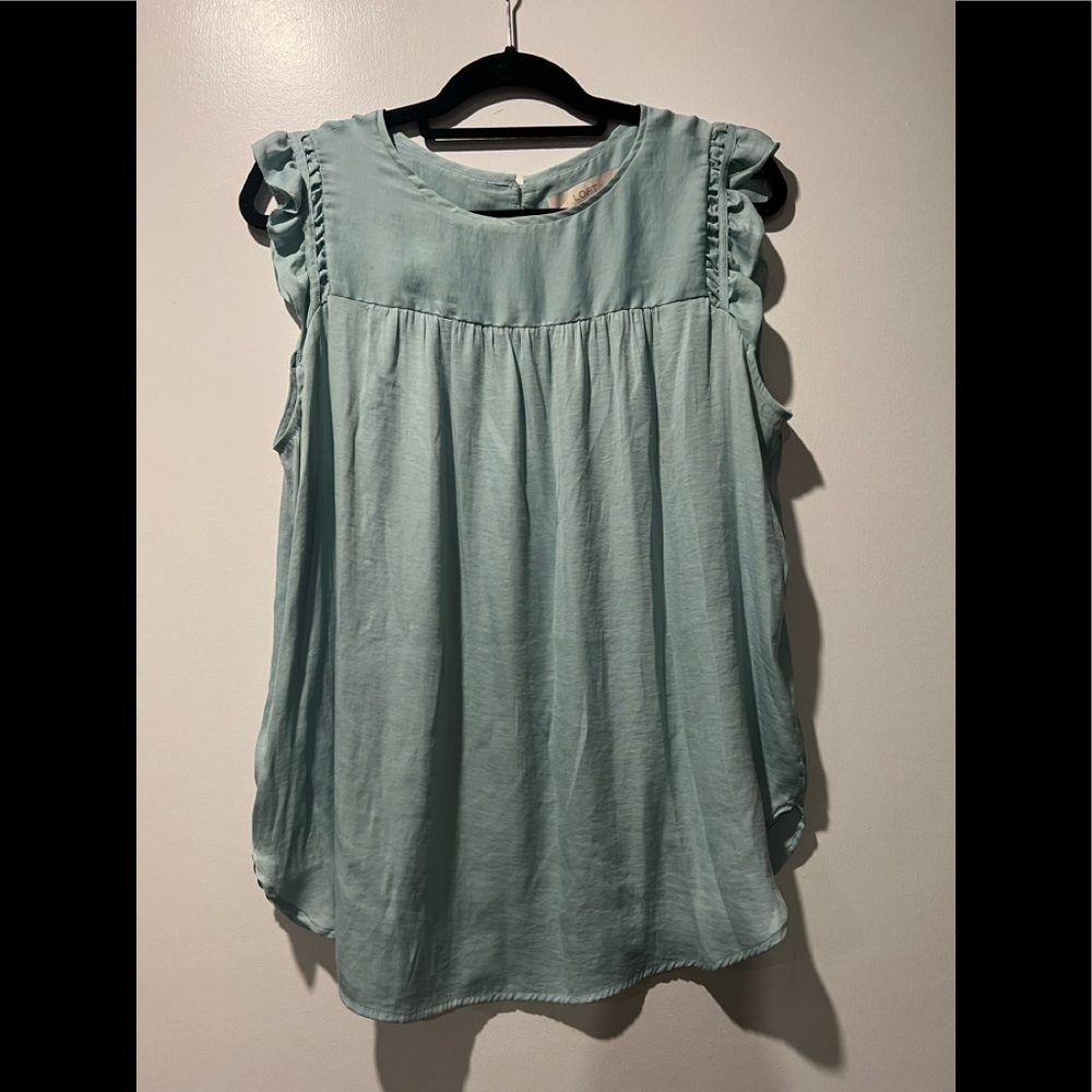 Blouse with ruffle cap sleeve